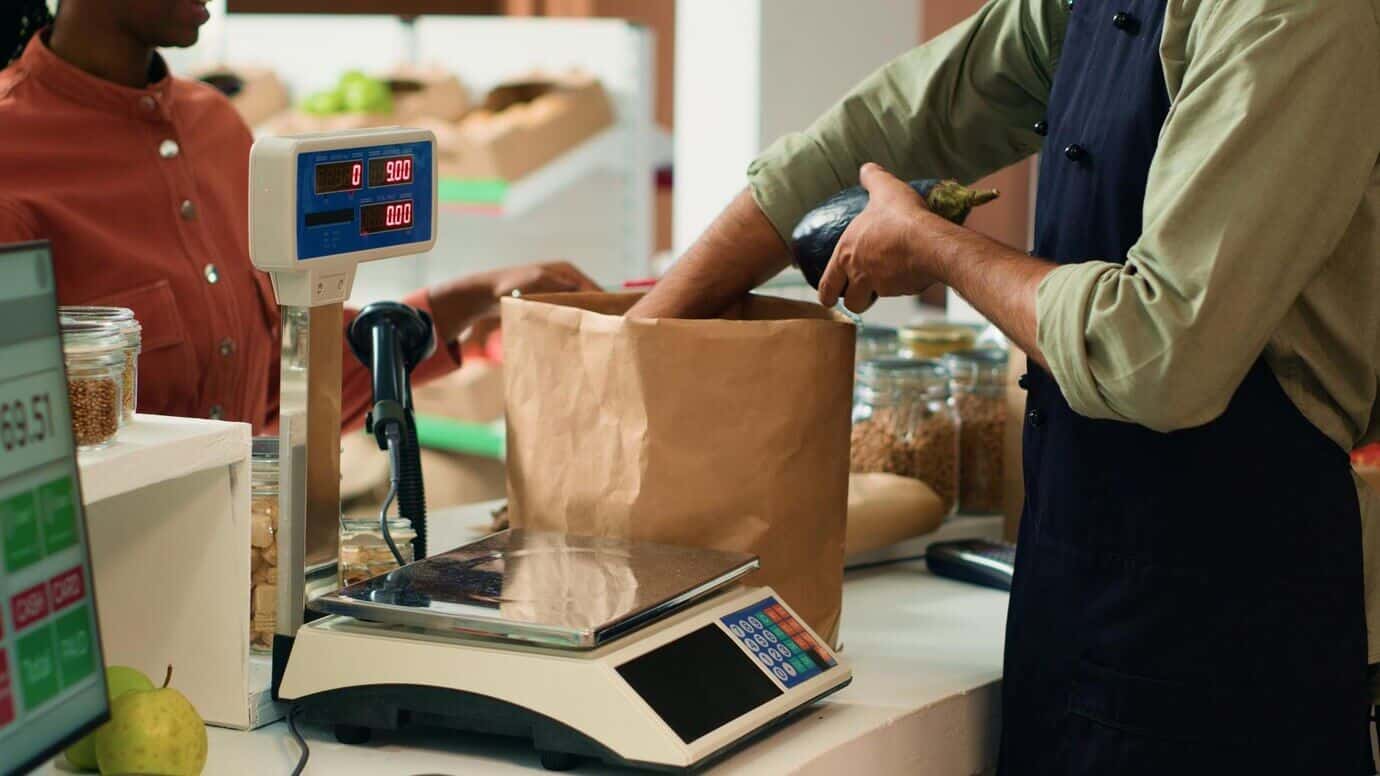 vendor weighting fresh produce buyer 482257 87223 1
